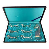 Set of 6 vintage silver metal knife holders and bottle opener, chev design