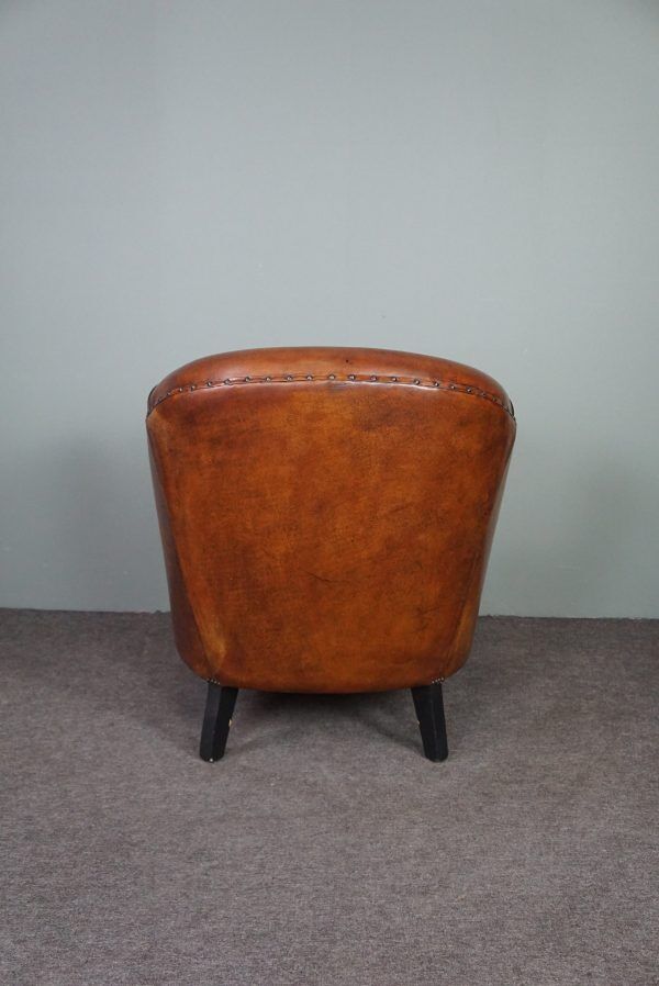 Leather club chair with black piping