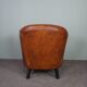 Leather club chair with black piping