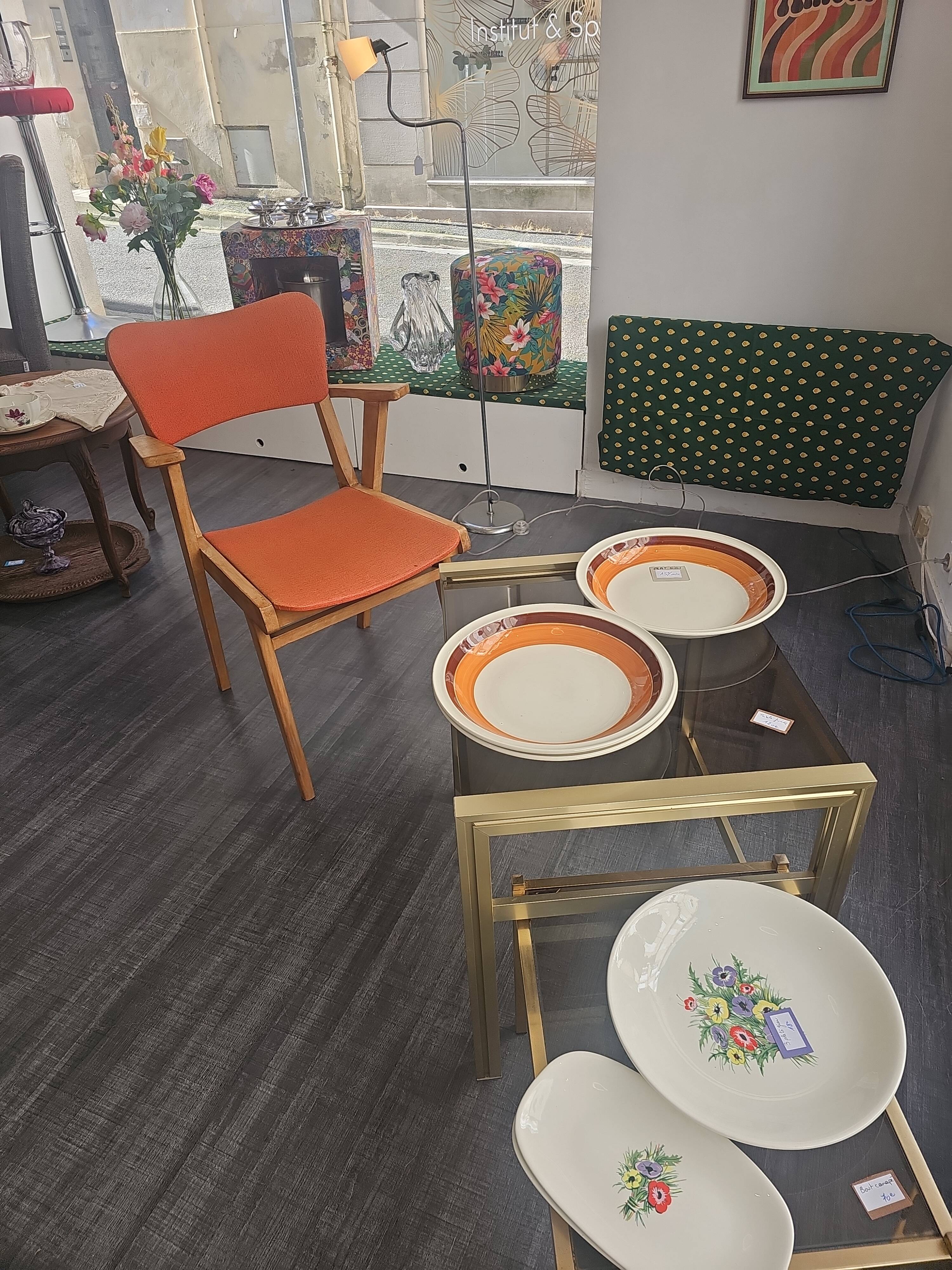 Modernist armchair in wood and orange fabric