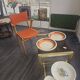 Modernist armchair in wood and orange fabric