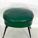Vintage Italian green leatherette pouf with brass feet from 50s
