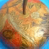 Partitioned brass apple