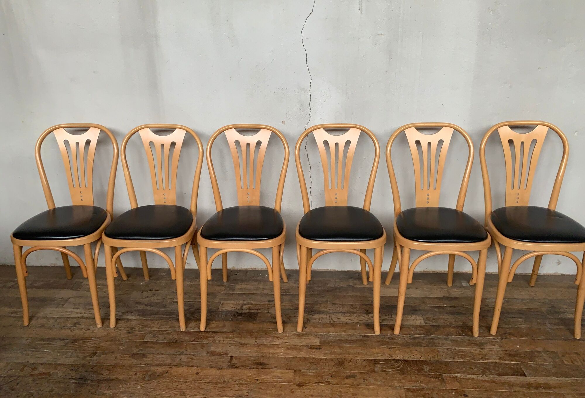 Series of 6 bistro chairs in curved wood seated skaï black