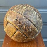 Mid-20th century leather soccer ball with visible stitching and beautiful patina