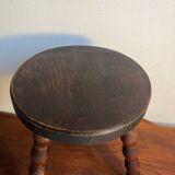 Round wooden tripod stool