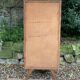 Vintage rattan chest of drawers with splayed legs from the 1950s.