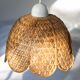 Vintage flower suspension in wicker rattan