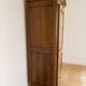 Antique wardrobe in classic style made of solid wood.