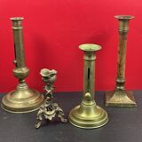 Set of 4 disparate brass candlesticks