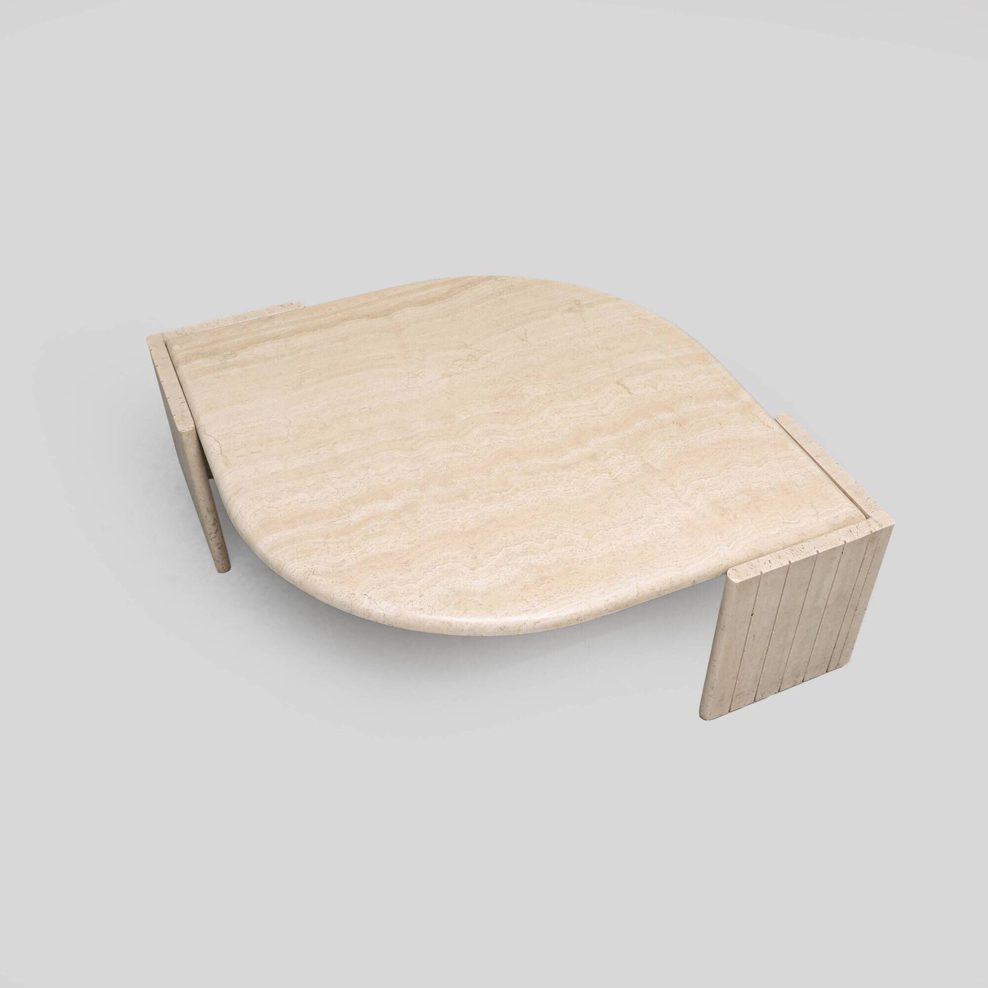 Vintage 'teardrop' travertine coffee table, Italy, 1970s.