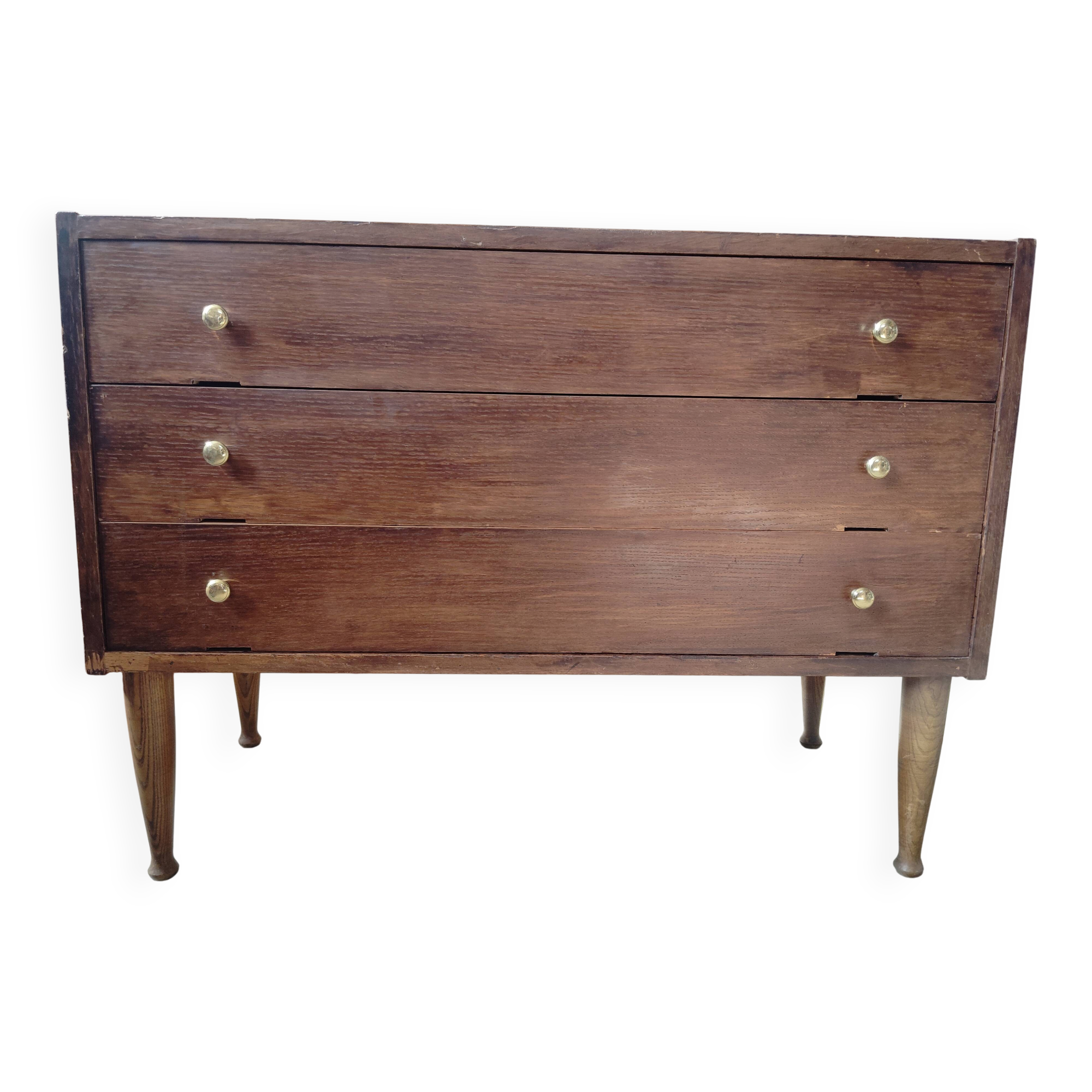 Vintage commode with tapered legs.