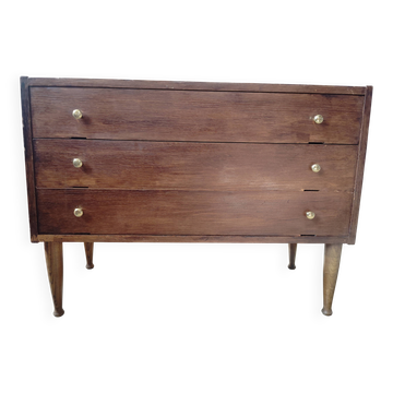 Vintage commode with tapered legs.