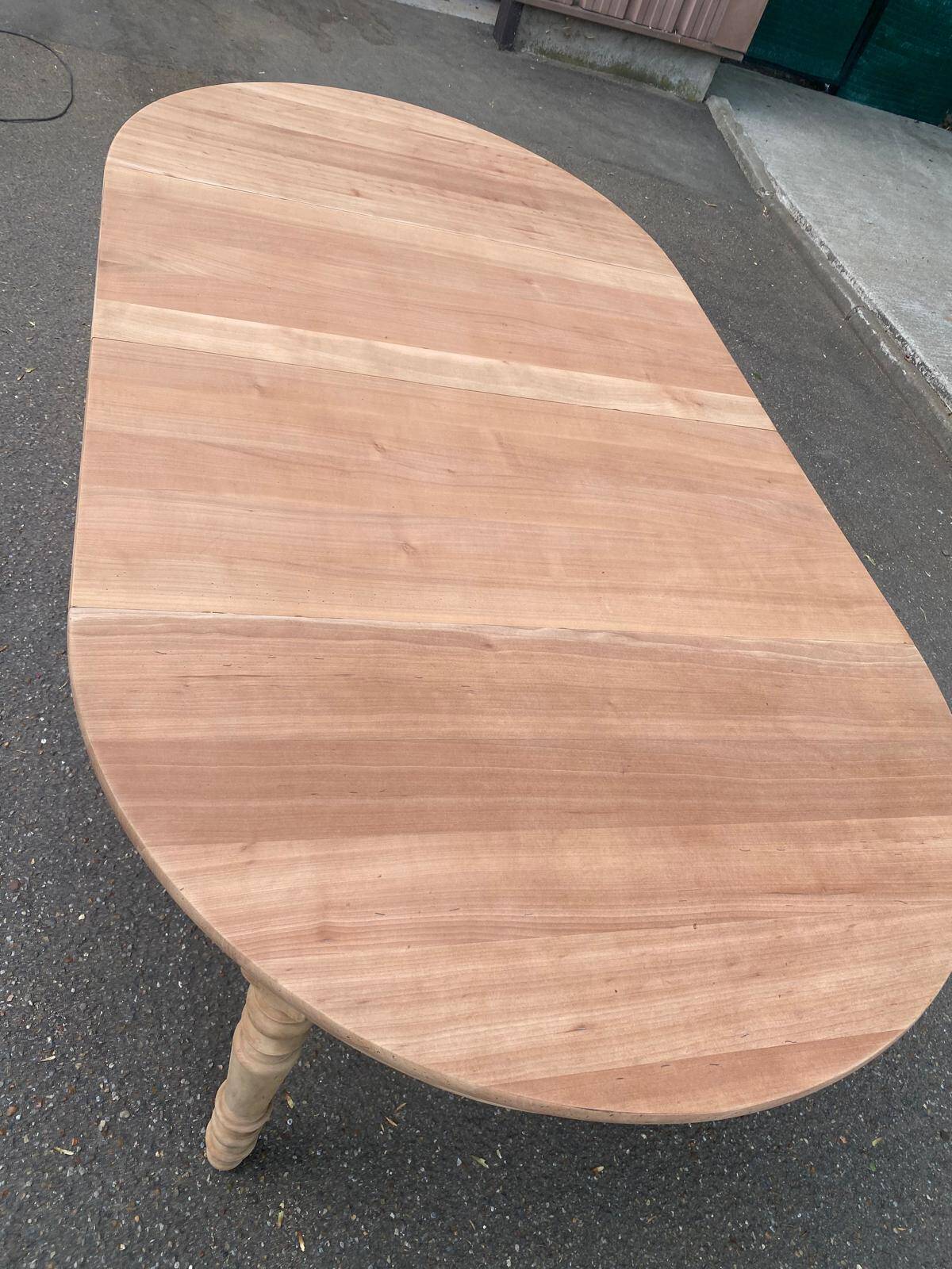 Round extendable dining table stripped in solid cherry wood France 1950