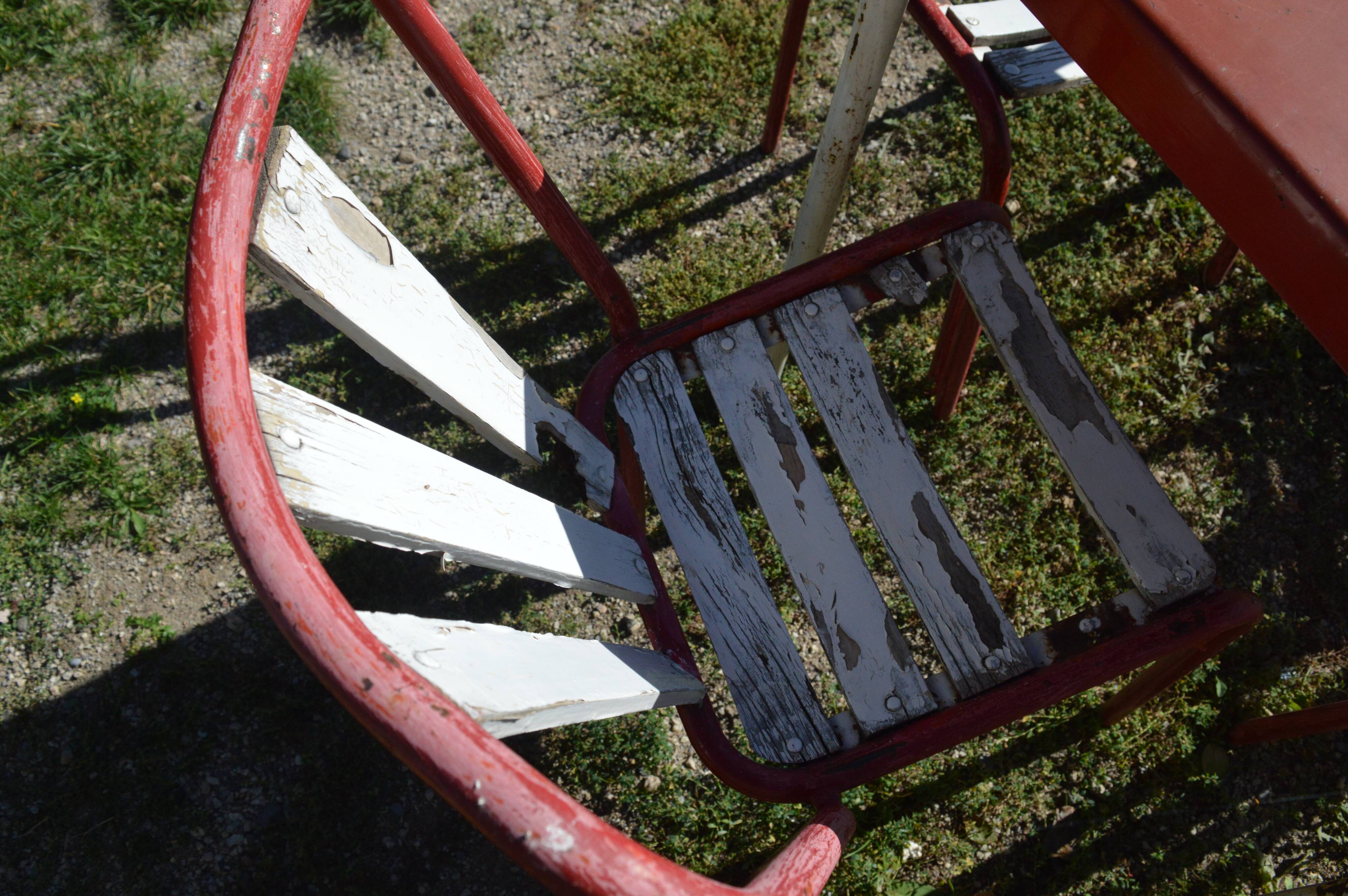 Table and four iron garden chairs from the 1950s