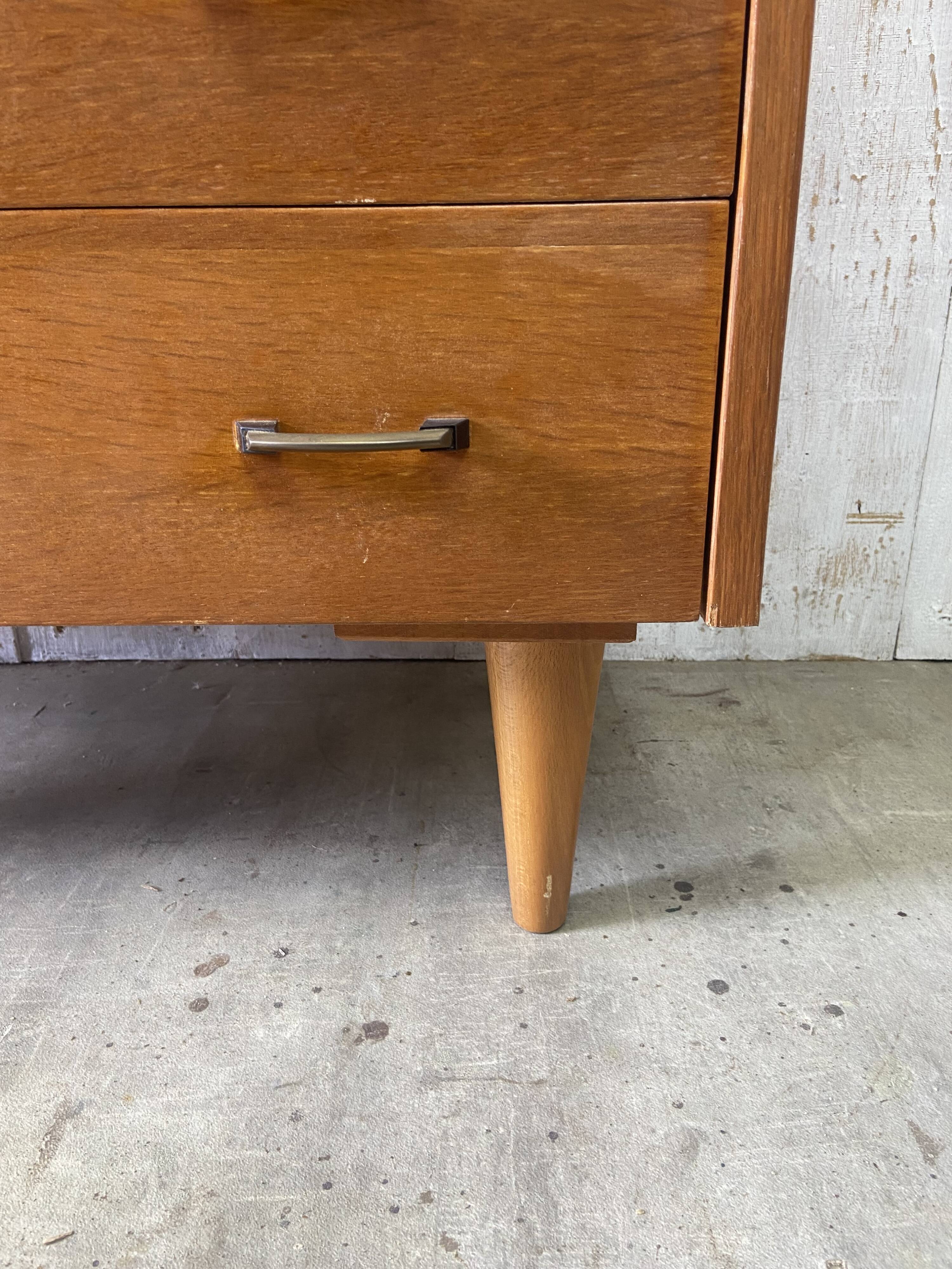 Vintage chest of drawers with conical legs