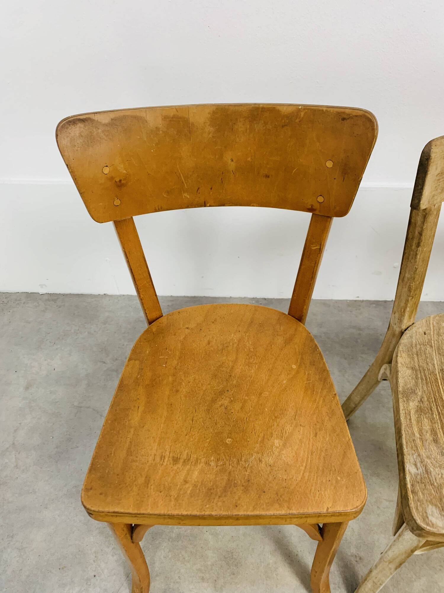 6 mismatched Baumann & Luterma bistro chairs, wood, 1960s
