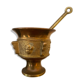 Old mortar and its bronze pillon