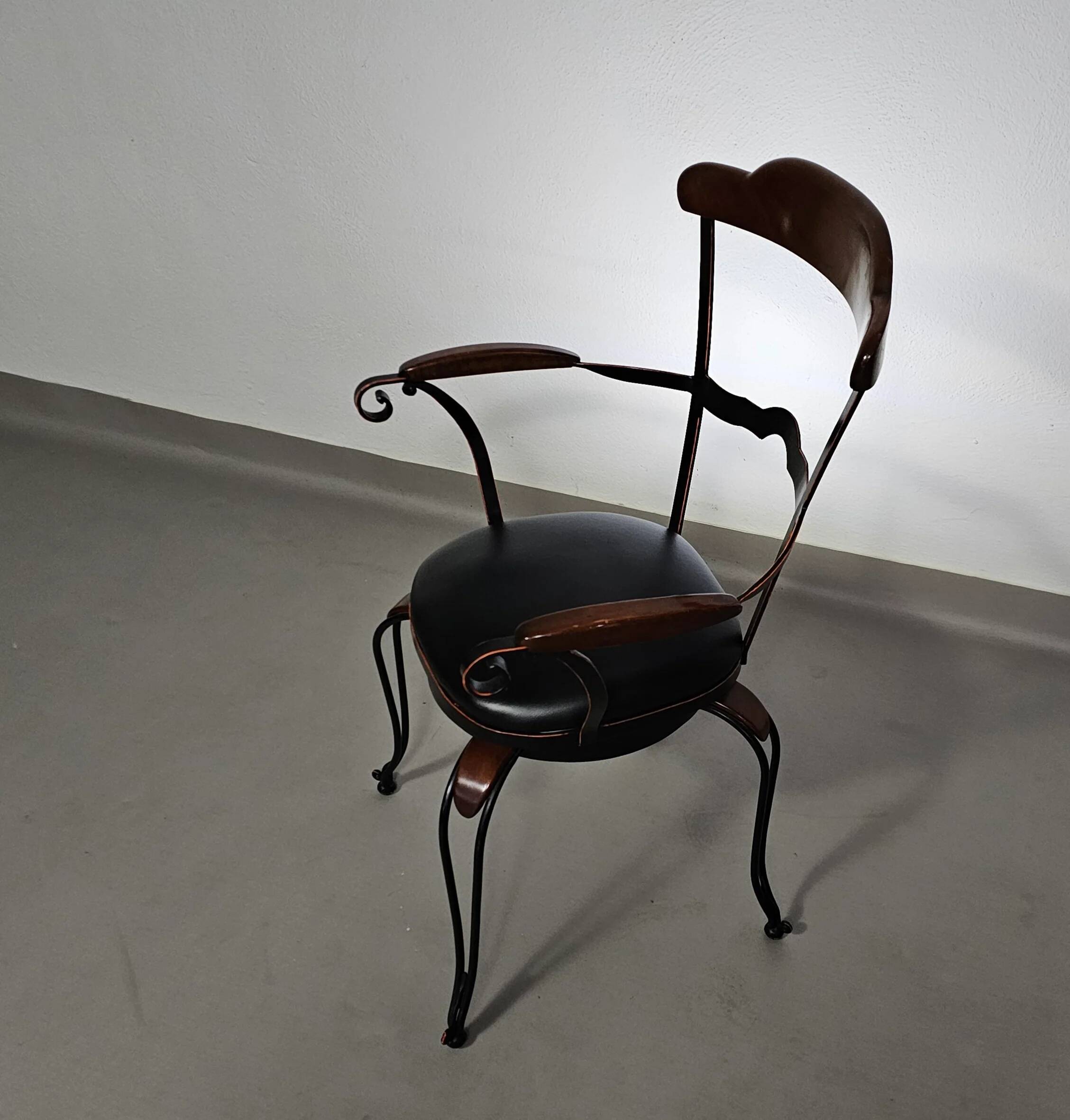 Italian postmodern turnable wrought iron dining chairs with leather seats