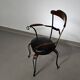 Italian postmodern turnable wrought iron dining chairs with leather seats