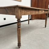 Antique farm table from the 1950s, with 3 drawers and turned legs