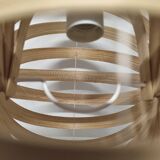 Nautilus shell-shaped chandelier made from bamboo slats