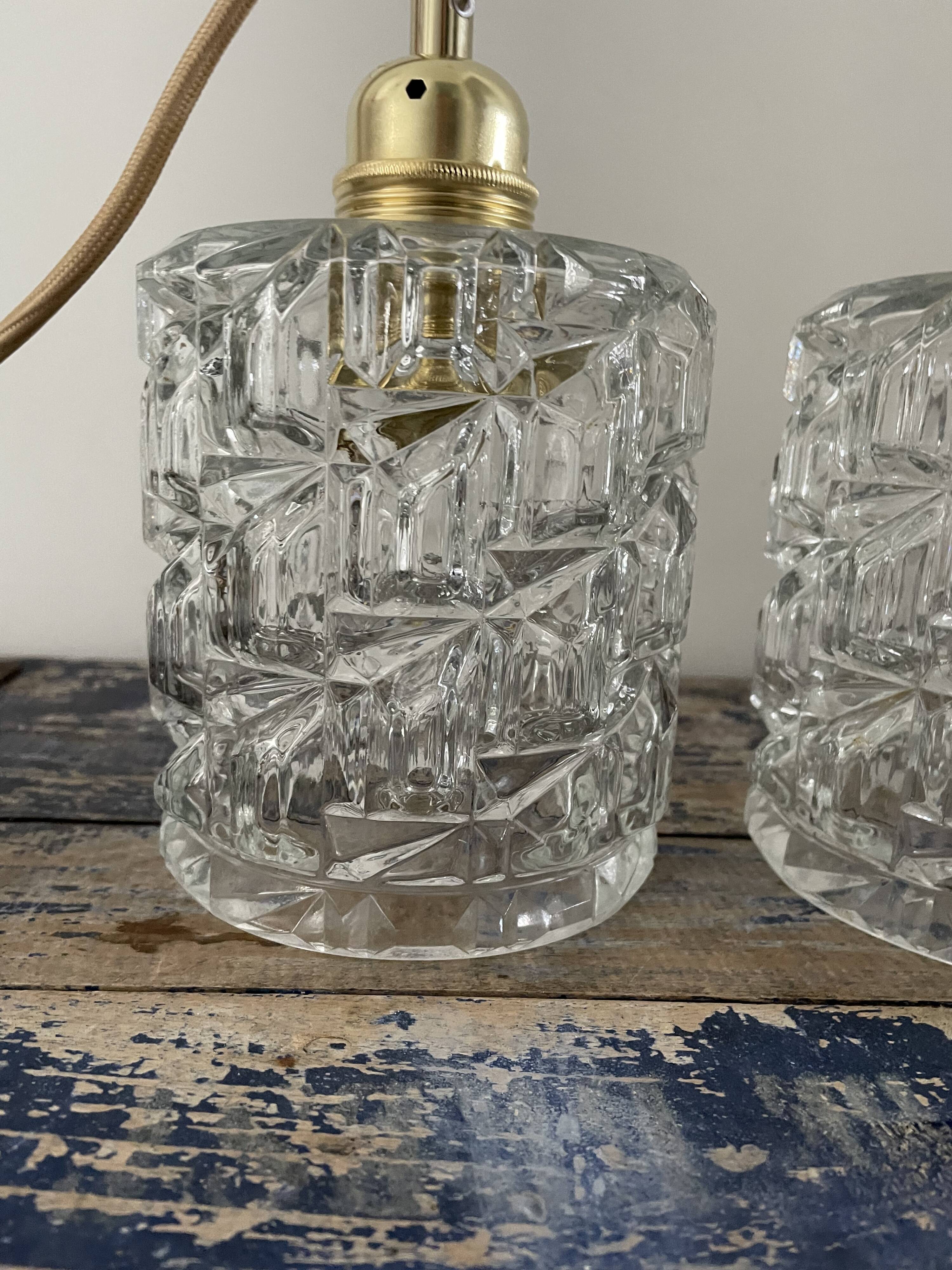 Set of two vintage electric chiseled glass walking lamps