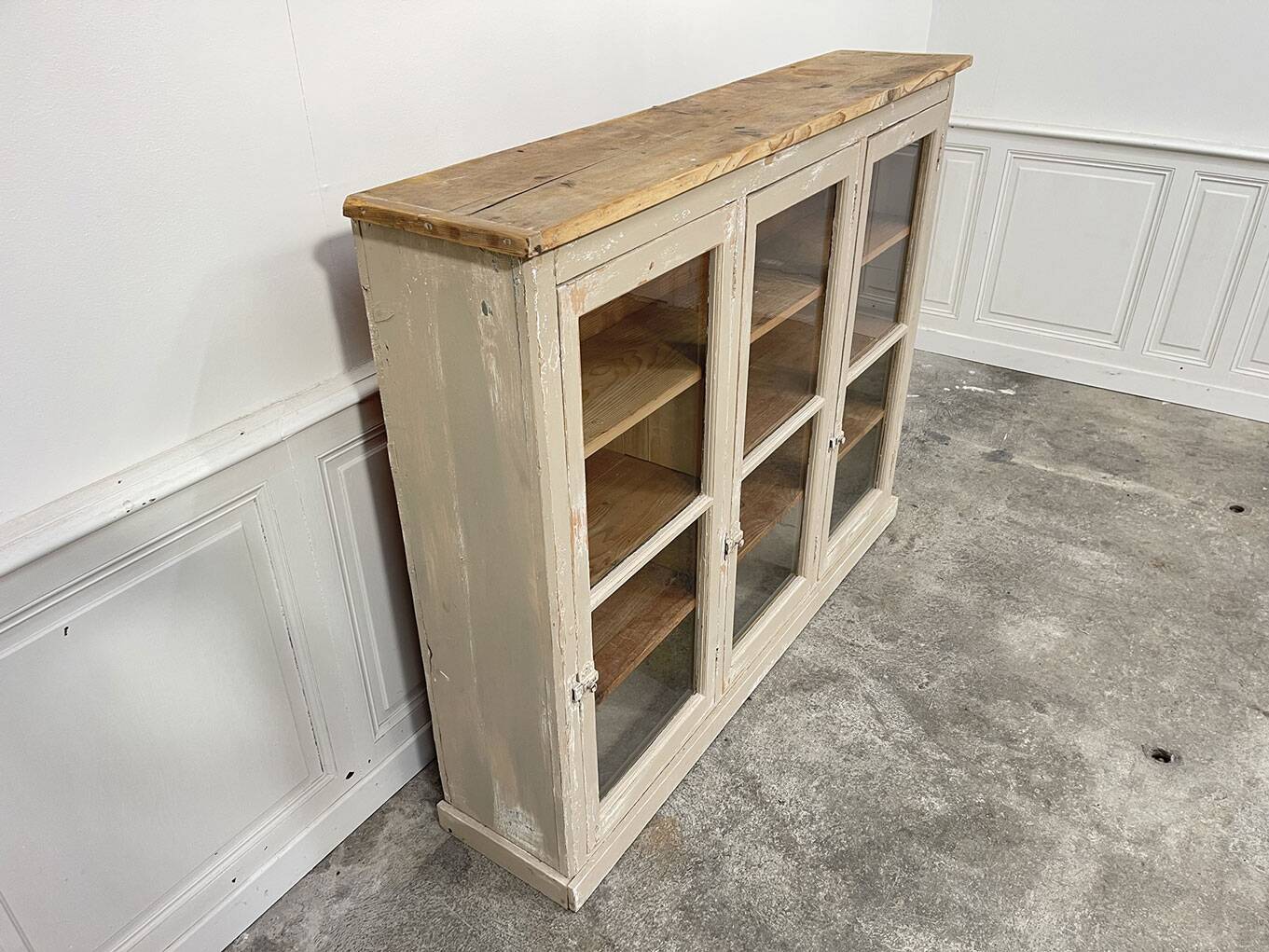 Old 1900 wooden grocery store display case with shelves