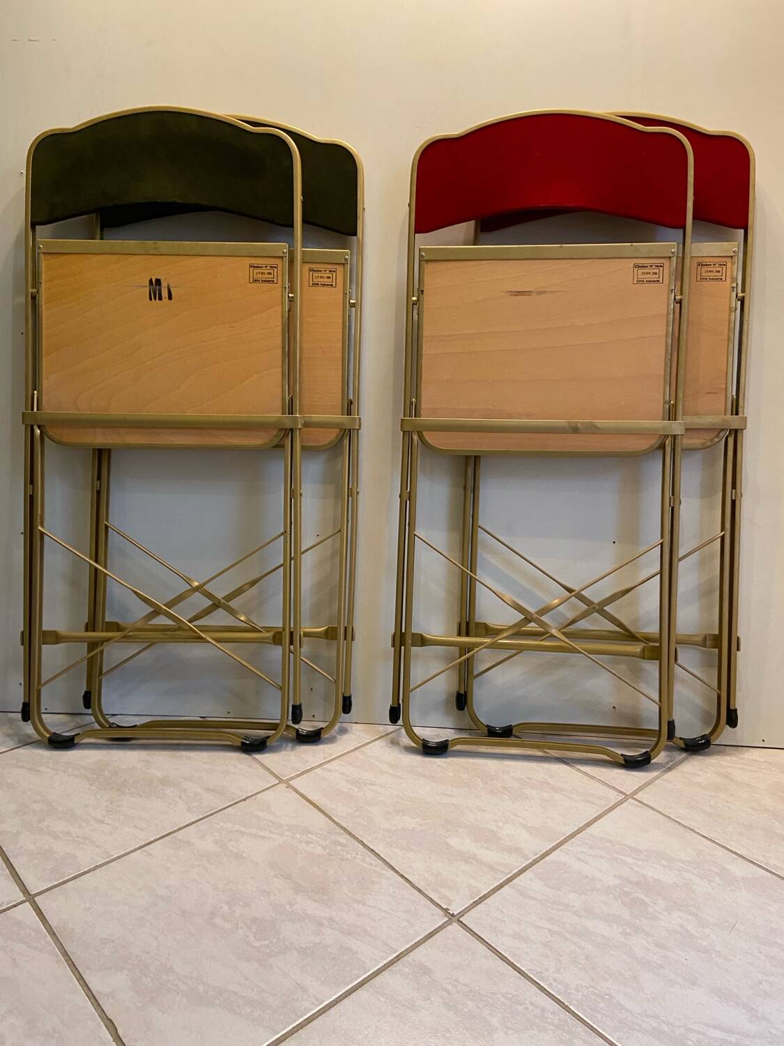 Velvet folding chair with gold metal.