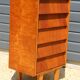 Dark chest of drawers with 5 drawers from the 1950s