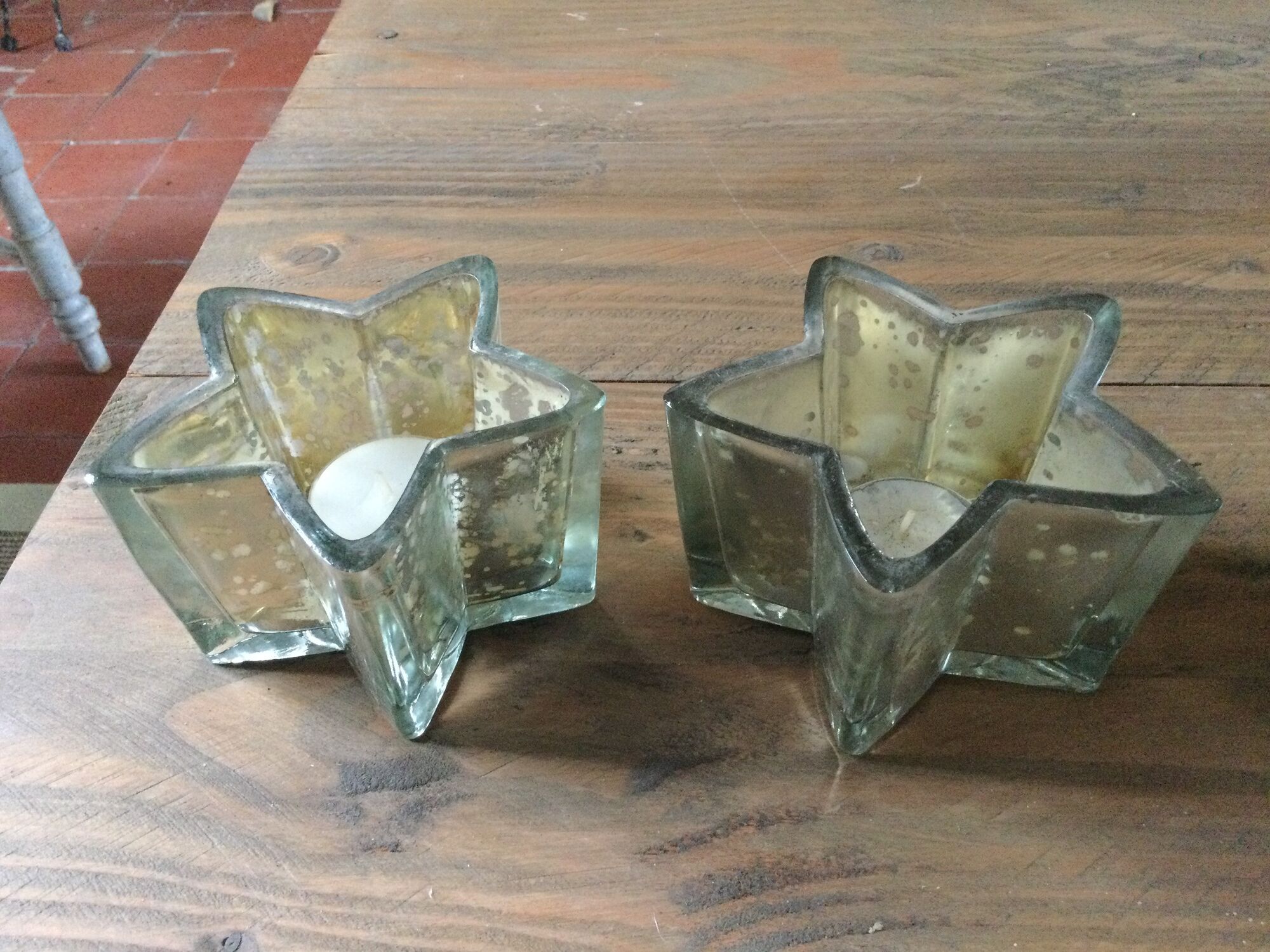 Pair of mercurized glass candle holders in the shape of stars