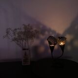 Perforated metal candle holder