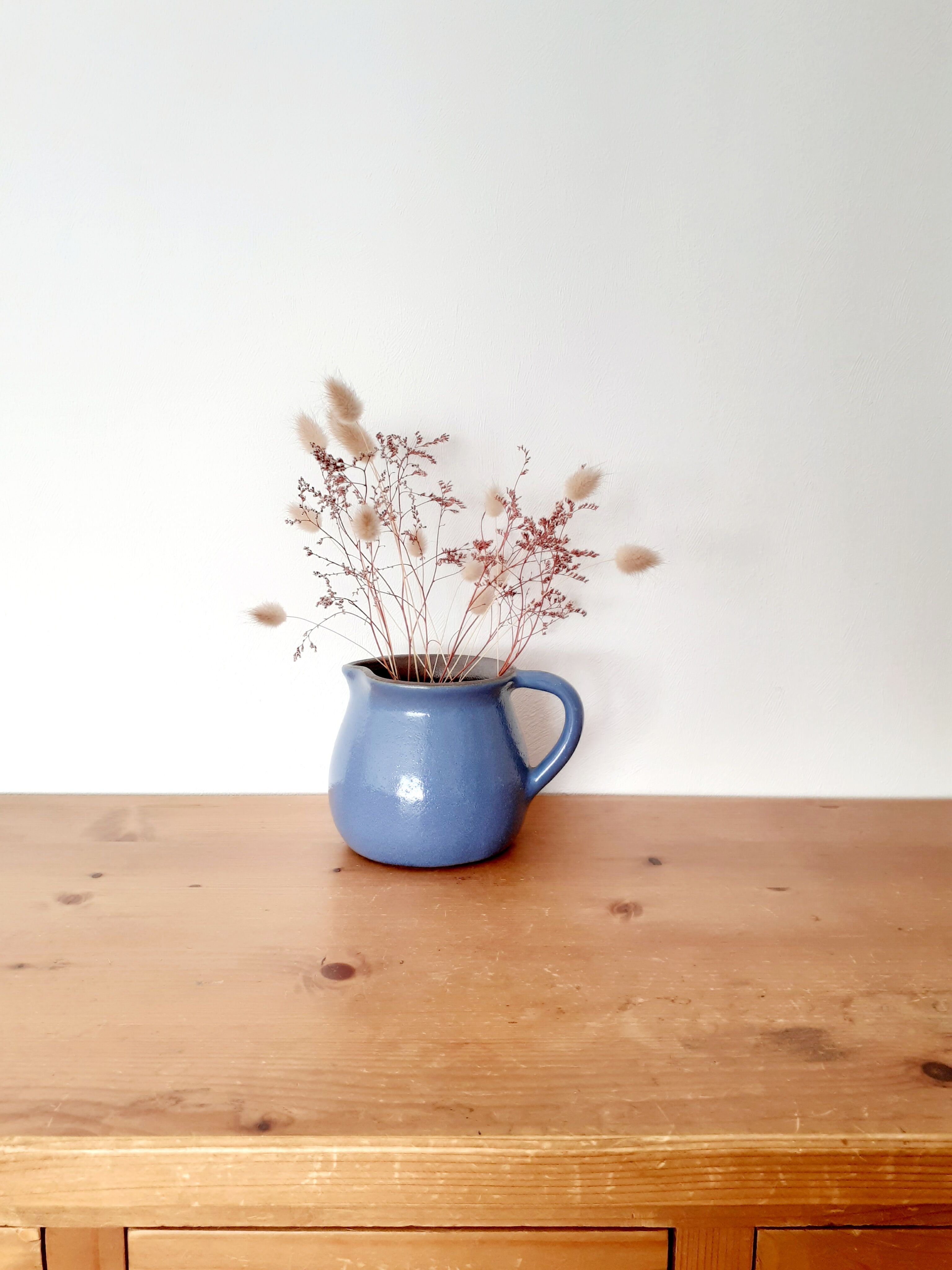 Old glazed blue sandstone pitcher