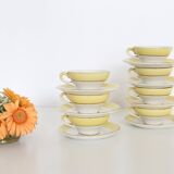 Set of 7 cups and under cups in ceramic Moulin des Loups, yellow, French manufacture,