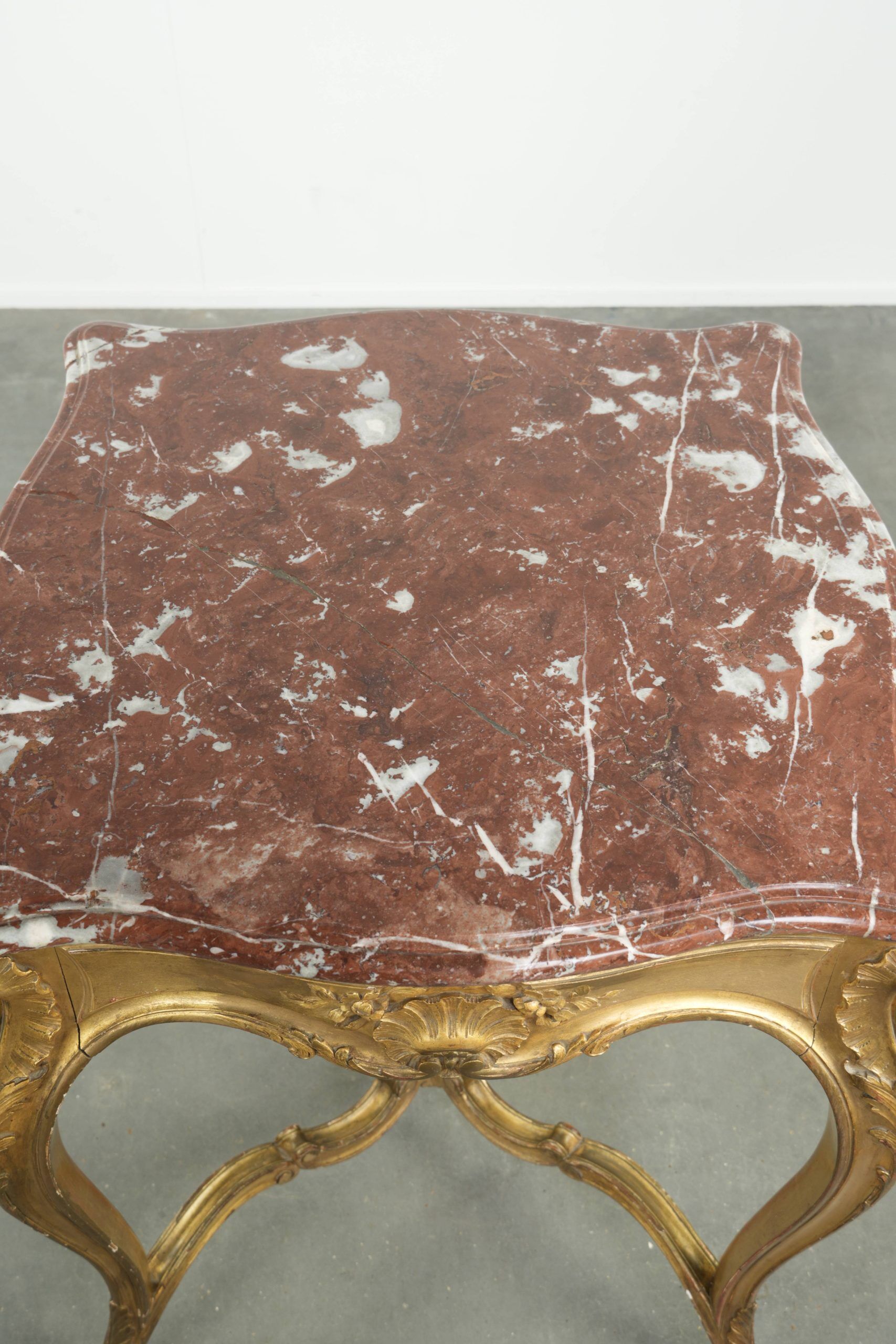 Antique French side table with marble tabletop from the 19th century