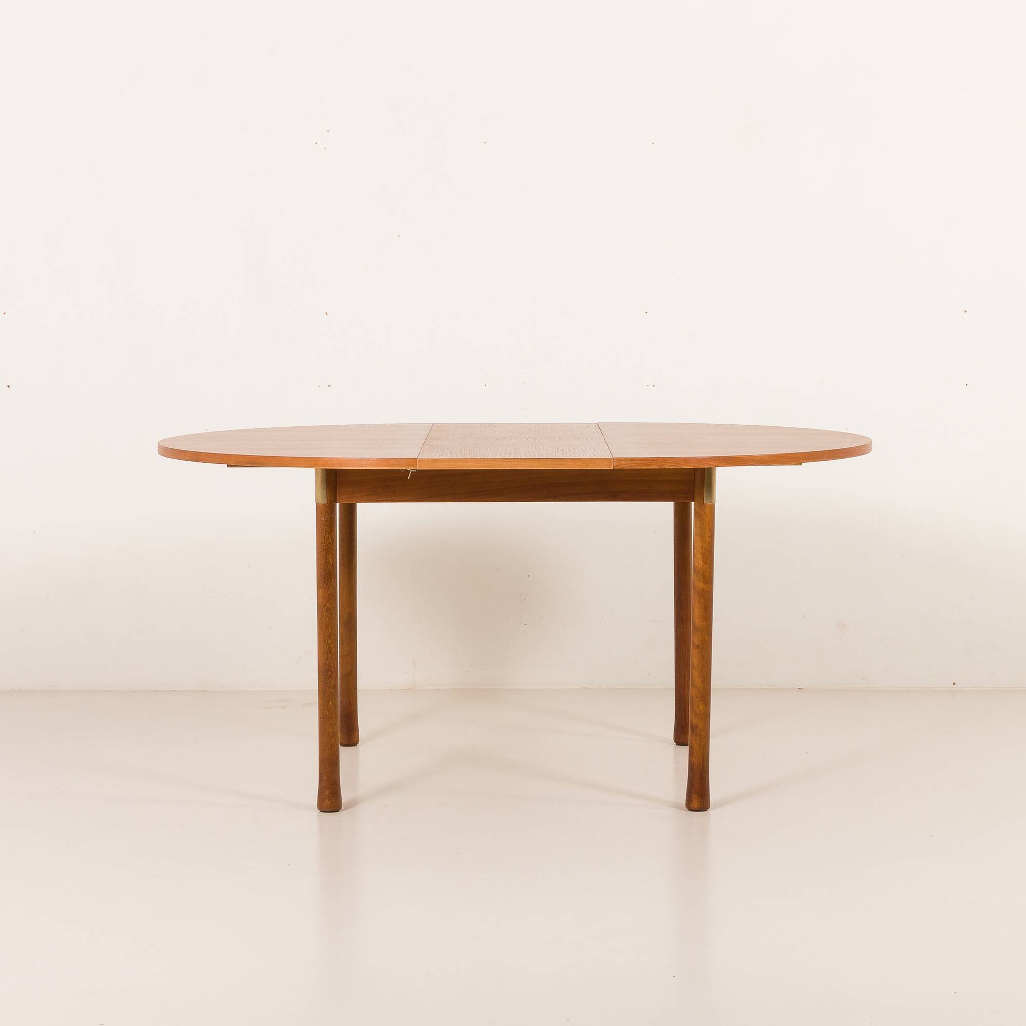 Italian mid-century round extension teak table with brass details, 1960s