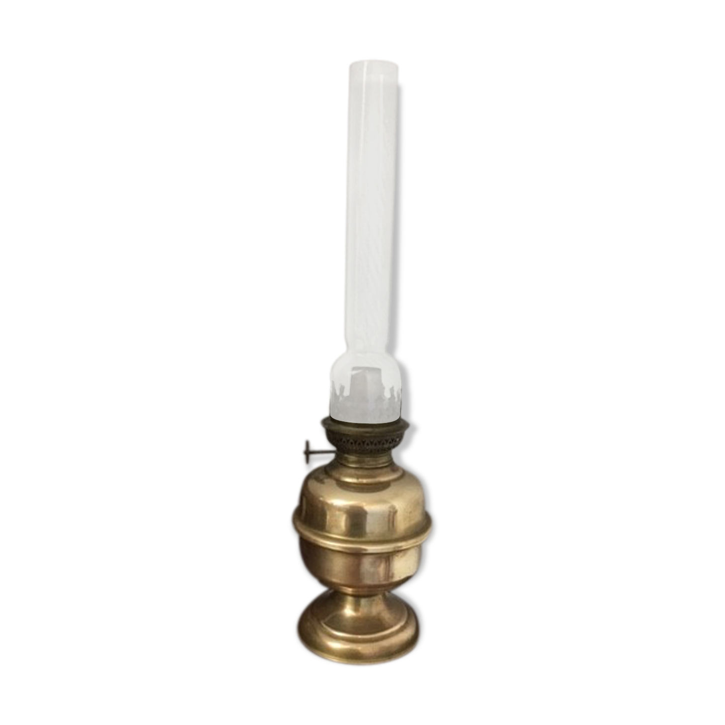 Old-fashioned brass standing oil lamp