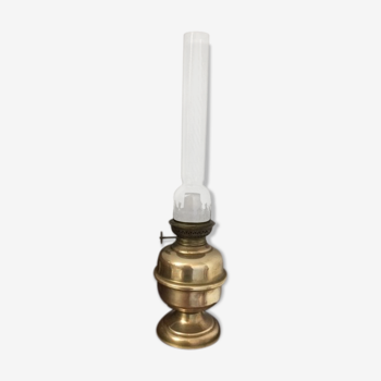 Old-fashioned brass standing oil lamp