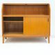 Modern Scandinavian wardrobe in teak with sliding doors and drop-down flap.