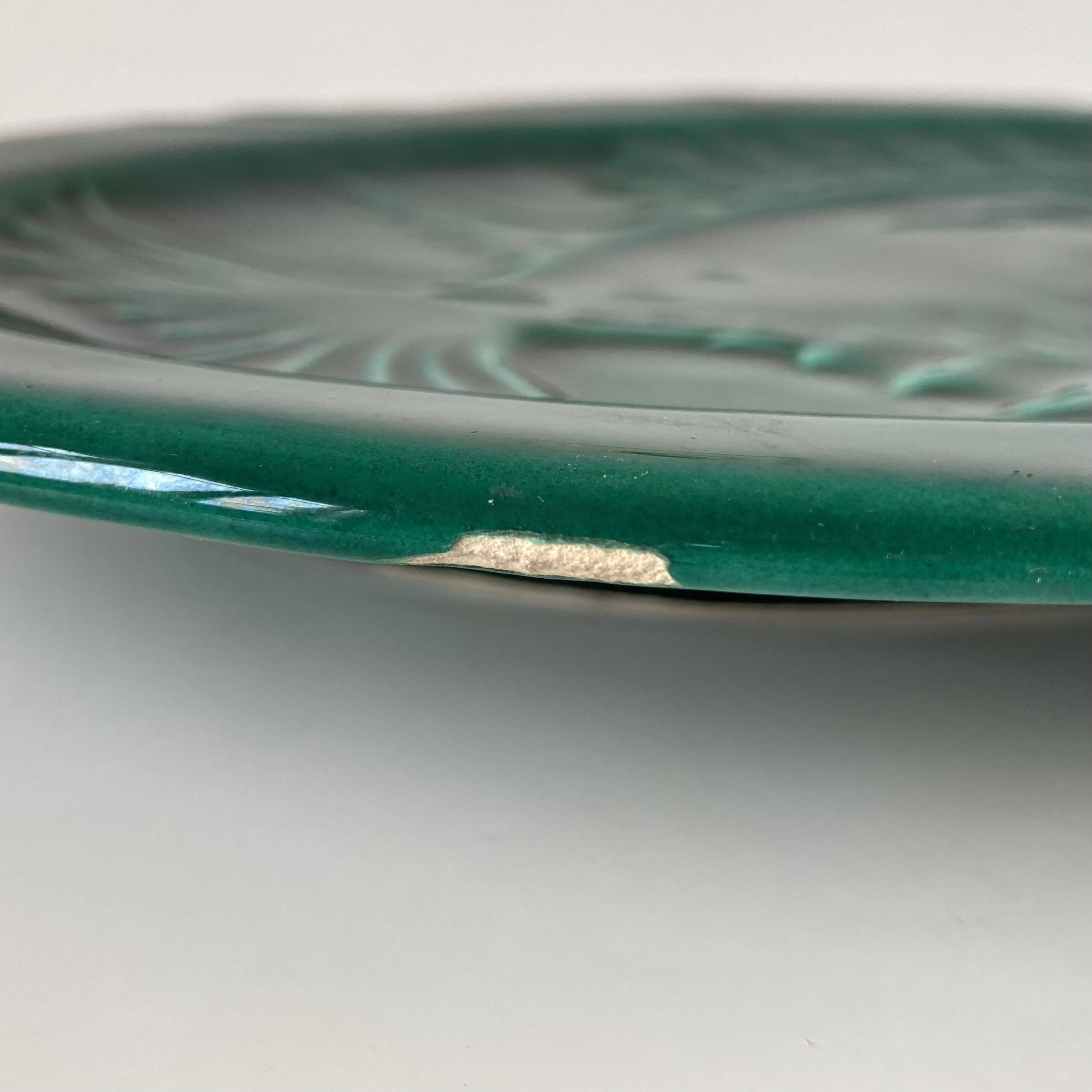 Vallauris - Large oval earthenware "fish" dish with green glaze