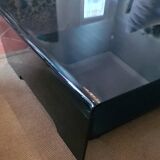 Curved glass coffee table