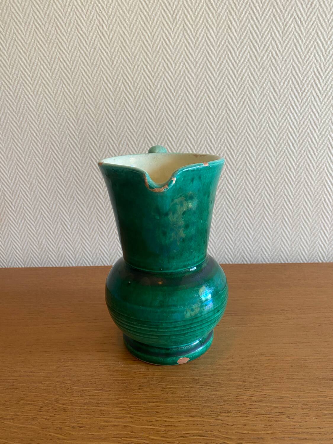 Green glazed ceramic carafe