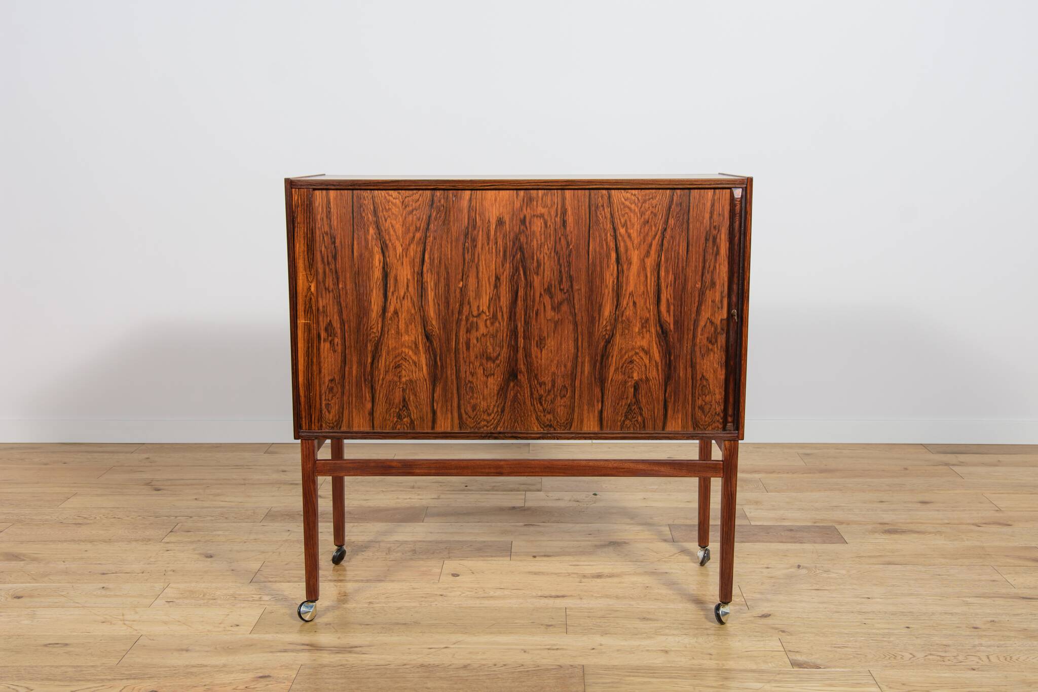 Mid-century rosewood bar with roller doors, Denmark, 1960s