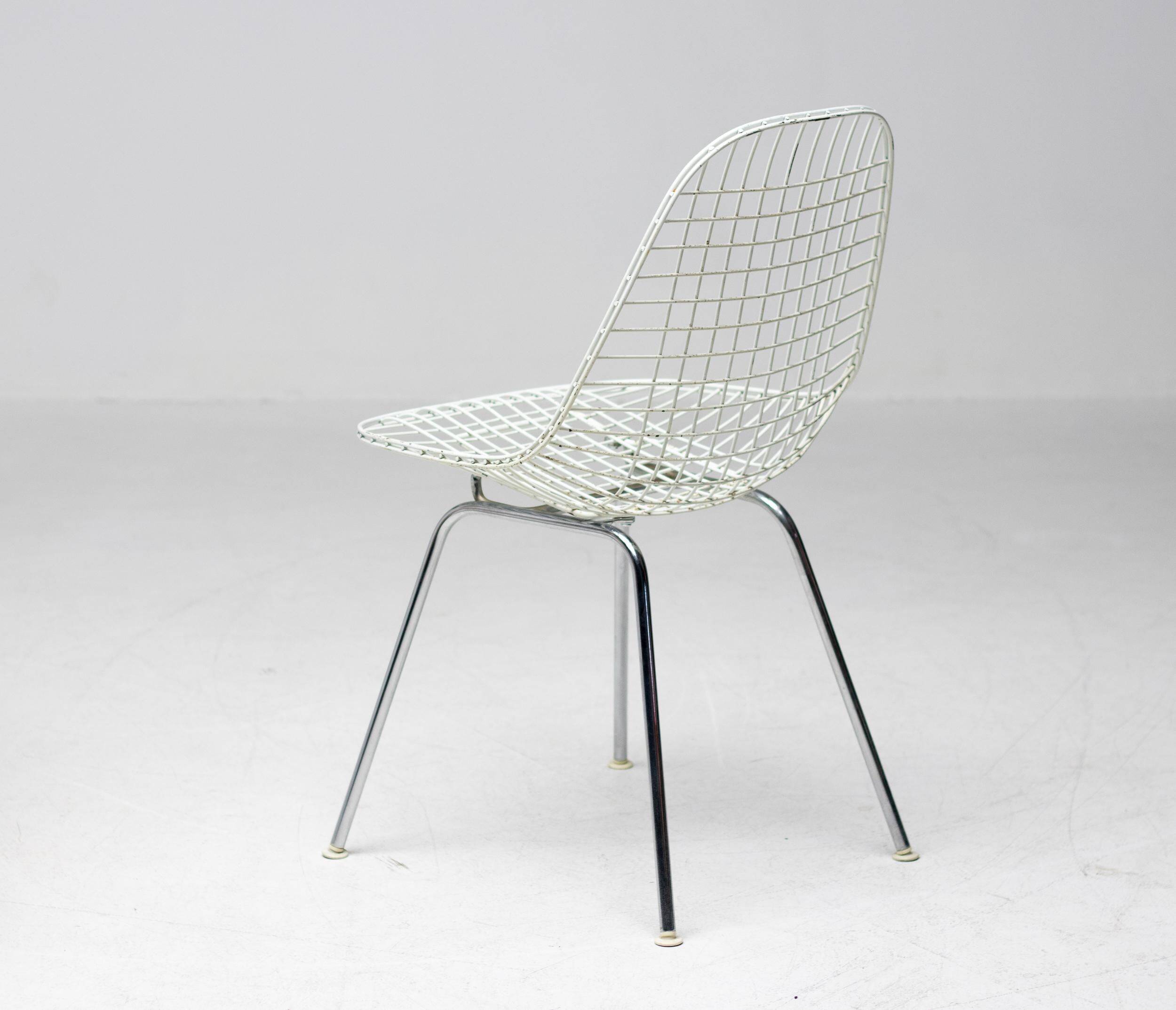 Set of 4 Eames wire chairs for Herman Miller with original Bikini seats by Girard.