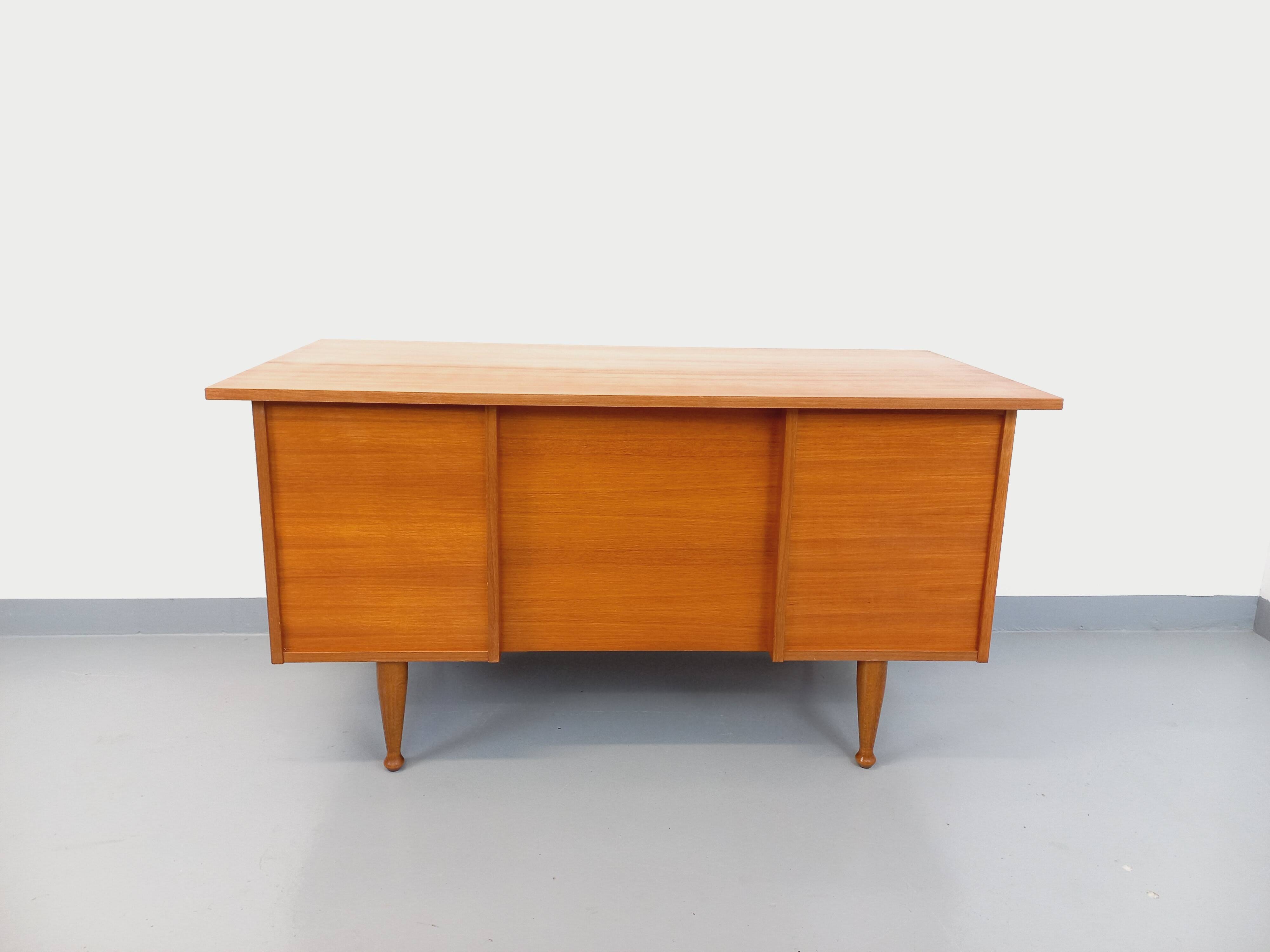 Vintage Scandinavian style executive desk in teak from the 60s