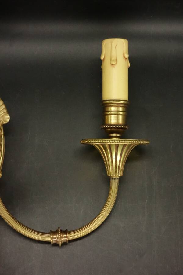 Pair of wall sconces with female masks in Louis XVI style - gilded bronze