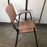 Old chair with armrest restored in metallic pink