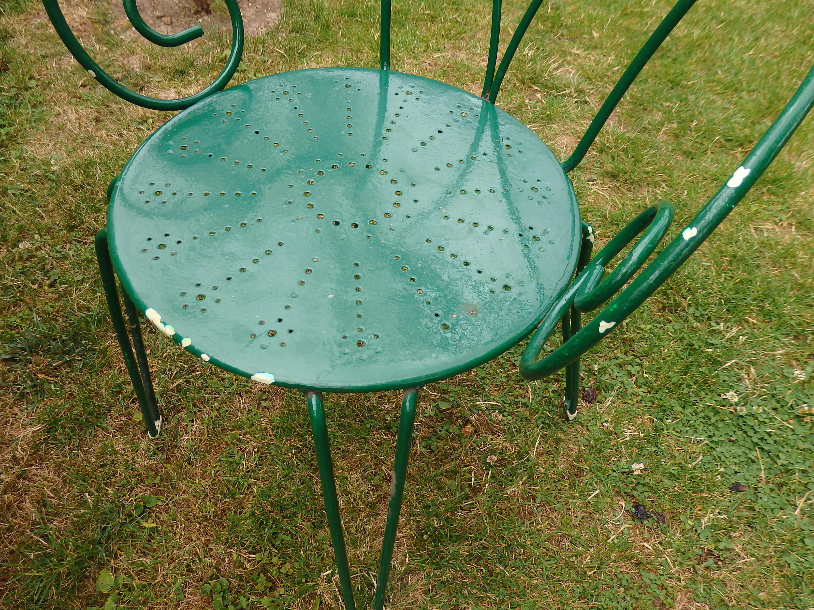 Wrought iron garden lounge table and 2 armchairs