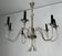 Neoclassical style chandelier in silver-plated metal by the house of Charles.