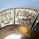 Ashtray and bronze candle holder with the 12 astrological signs of the zodiac